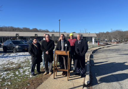 Supervisor Matt Slater and town officials discuss a streetscape renewal project at Downing Drive on December 13, 2022. Photo cou